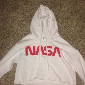 A cropped nasa hoodie